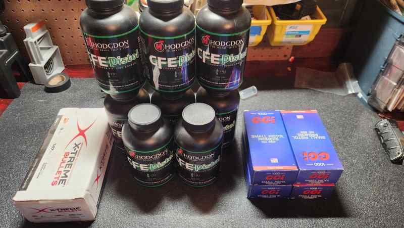 Small pistol primers and powder