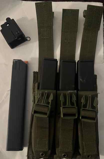 4 - 9mm Colt 32 round magazines with fast loader