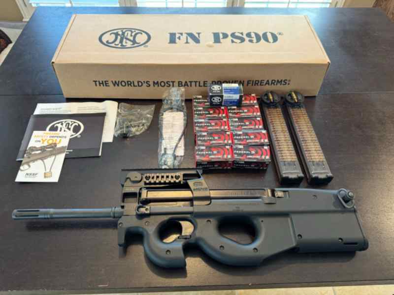 NIB FN PS90.   Never fired.  Lots o EXTRA’s!