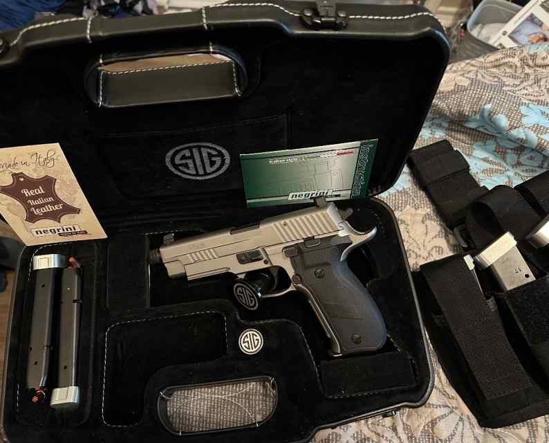 SIG P226 Stainless w/ German frame. Executive pack