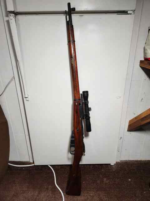 1942 Mosin Nagant 91/30 with modern relief scope