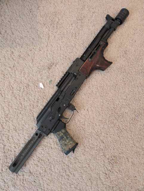 Custom built AKM104 pistol.